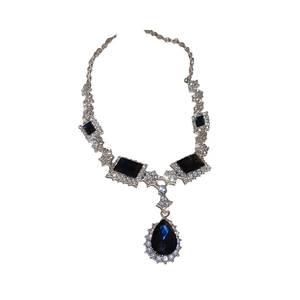 Vintage geometric jewelry set with dark blue waterdrop gemstones and crystal accents
