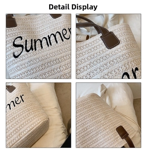Detail view of woven straw tote bag with Summer embroidery and brown leather handles