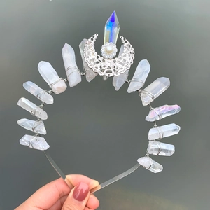 Detailed macro view of handmade natural crystal crown headband with silver moon and pearls