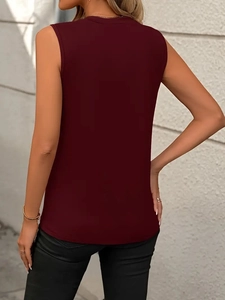 Detail view of the deep wine red sleeveless top showing back fit and knit fabric texture