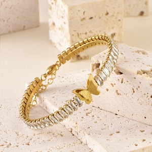 Elegant gold butterfly bracelet featuring rectangular zircons and a matte finish charm