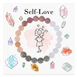 Detail of multi-color natural stone beads surrounding a Self-Love art card illustration