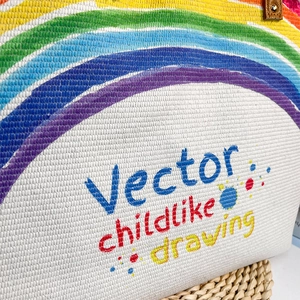 Detail of bohemian rainbow embroidery and vibrant tassel texture on canvas bag