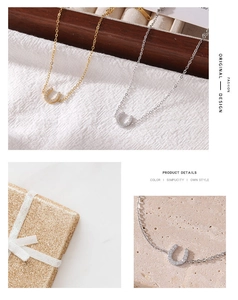 Detailed views of gold and silver U-shaped horseshoe necklaces in premium gift packaging
