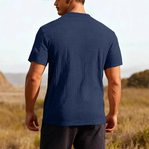 Navy blue men's waffle textured T-shirt shown from back view in a minimalist slim fit