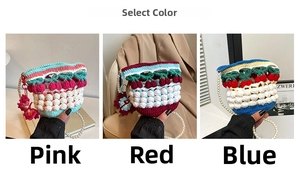 Detail of crochet bucket bag with cherry texture and white pearl beaded strap
