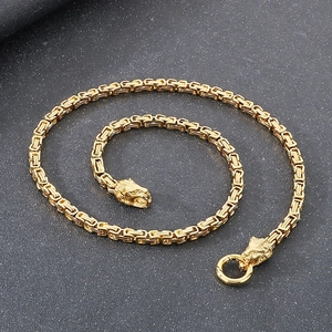 Gold Byzantine chain necklace with majestic lion head pendants in punk rock style