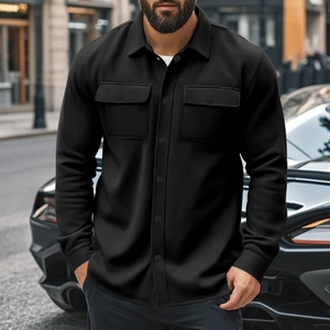 Close-up of black fleece-lined shirt jacket with lapel and buttoned chest pockets