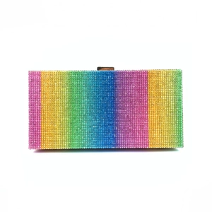 Close-up of rainbow rhinestone clutch bag showing sparkling crystal texture and metal clasp