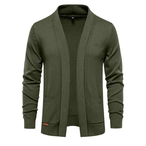 Detail of olive green knit cardigan with textured fabric and side patch pockets