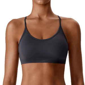 Seamless charcoal sports bra with spaghetti straps and ribbed triangle support detail