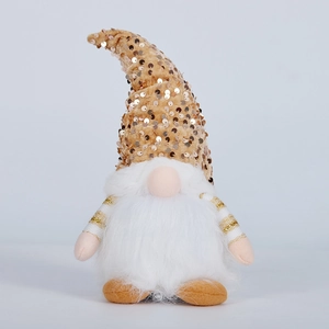 Close-up of a glowing Christmas gnome with gold sequins and a long white fiber beard