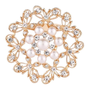Elegant gold butterfly brooch with white pearls and sparkling rhinestones in a circular design