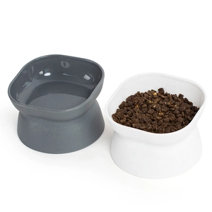 Dual-color elevated pet feeder with tilted bowls for neck protection in grey and white