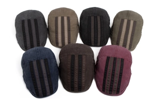 Detail view of retro washed cotton ivy caps showing various colors and stitched stripe design