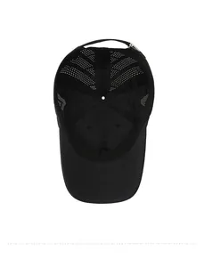 Internal view of black mesh baseball cap featuring laser-cut breathable holes and metal buckle