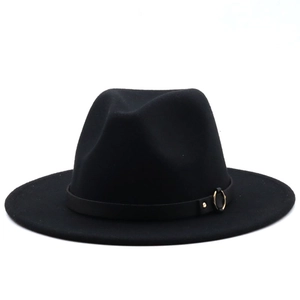 Close-up of black wool felt fedora featuring a slim leather band and gold metal ring detail