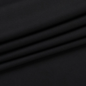 Macro view of black ribbed knit fabric showing detailed texture and soft draped material