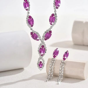 Detail view of rose pink marquise stones and zircon fringe on silver bridal jewelry set