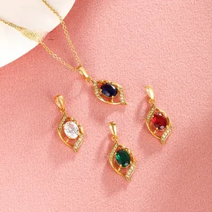 Detail of four multi-colored gemstone pendants with tiny diamonds on a gold chain