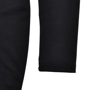 Macro shot showing high-quality black cotton blend fabric texture and stitching details