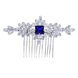Luxurious silver bridal hair comb with large blue gem and sparkling zircon crystals