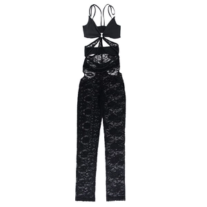 Close-up of intricate floral lace texture on a black backless sheer bodysuit