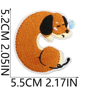 Detailed embroidery patch sizing view showing 5.2cm by 5.5cm dimensions of the dachshund dog
