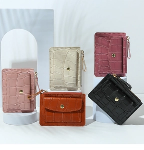 Detailed view of crocodile pattern PU leather card holders in five stylish colors