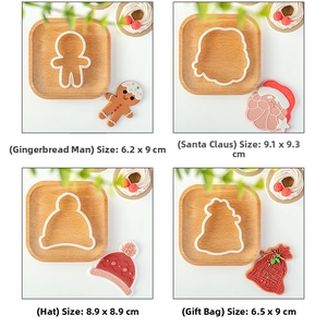 Detailed view of 4-piece Christmas cookie cutter set with gingerbread man and santa shapes