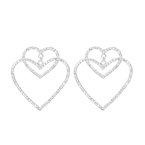 Luxurious silver double heart earrings with shimmering rhinestones on white background