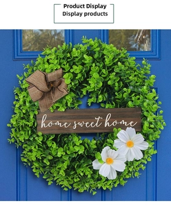 Rustic Christmas wreath on blue door with wood sign and burlap bow detail