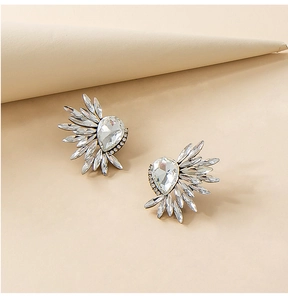 Detail of tear-drop crystal stud earrings with radiant marquise-cut stones and alloy base