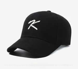Close-up of premium black cotton twill baseball cap with white 3D embroidered K letter