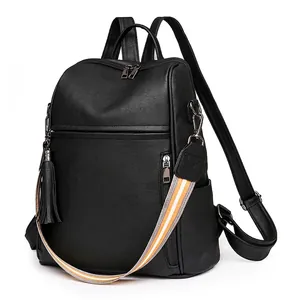 Vintage black lychee PU leather backpack for women with striped strap and tassel detail
