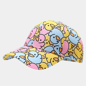 Macro side view showing colorful cartoon duck print and stitching on twill cotton baseball cap