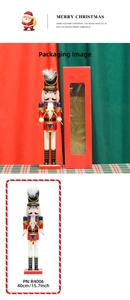 Detailed view of a 40cm wooden nutcracker soldier with its red rectangular gift box