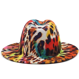 Macro shot of vibrant multicolor leopard print texture on a stiff fedora felt hat