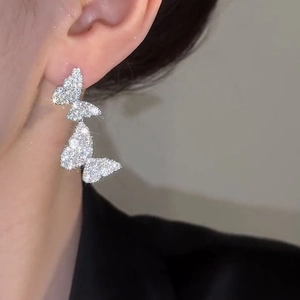 Elegant silver butterfly drop earrings with sparkling pavé crystals for a stylish look