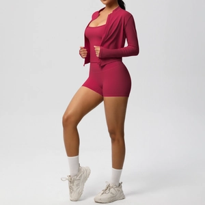 Detailed view of the 3-piece rose red yoga set with jacket, sports bra, and high-waist shorts