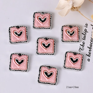 Pink heart resin charm with silver wavy frame and dot texture for DIY accessories