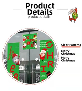 Detail of green Merry Christmas banner on glass door showing clear printing quality