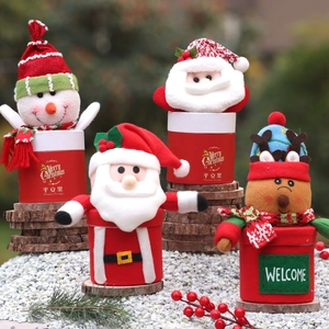 Set of 4 Christmas gift boxes with Santa, Snowman and Reindeer dolls for treats