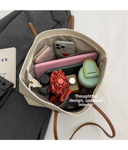 Interior view of large capacity tote bag showing spacious compartments and storage