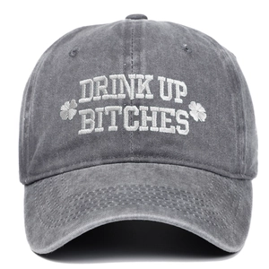 Macro shot of grey washed cotton baseball cap with white 3D clover embroidery