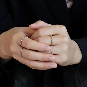 Minimalist geometric rhombic facet rings in gold and silver finish for layered styling