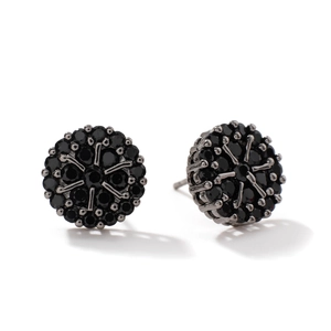 Modern geometric copper stud earrings with black zircon stones in a radial pattern on white