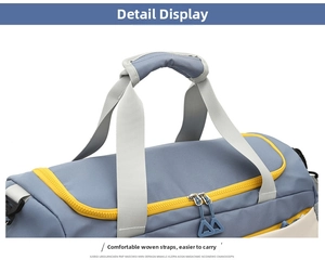 Close-up detail of the durable handle and zipper on the large capacity travel duffel bag.