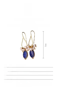 Detail view of 5cm long natural baroque pearl and blue lapis lazuli drop earrings