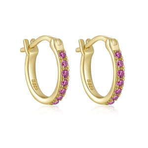 Detail of S925 sterling silver gold-plated hoop earrings with pink zircons inlay